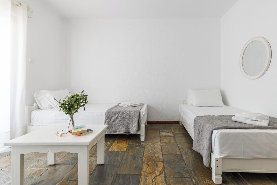 Family Suite, 2 Bedrooms | Pillowtop beds, in-room safe, free WiFi, bed sheets
