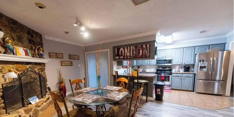 Serving those tasty delicacies was never more accessible as the dining table was next to the kitchen.