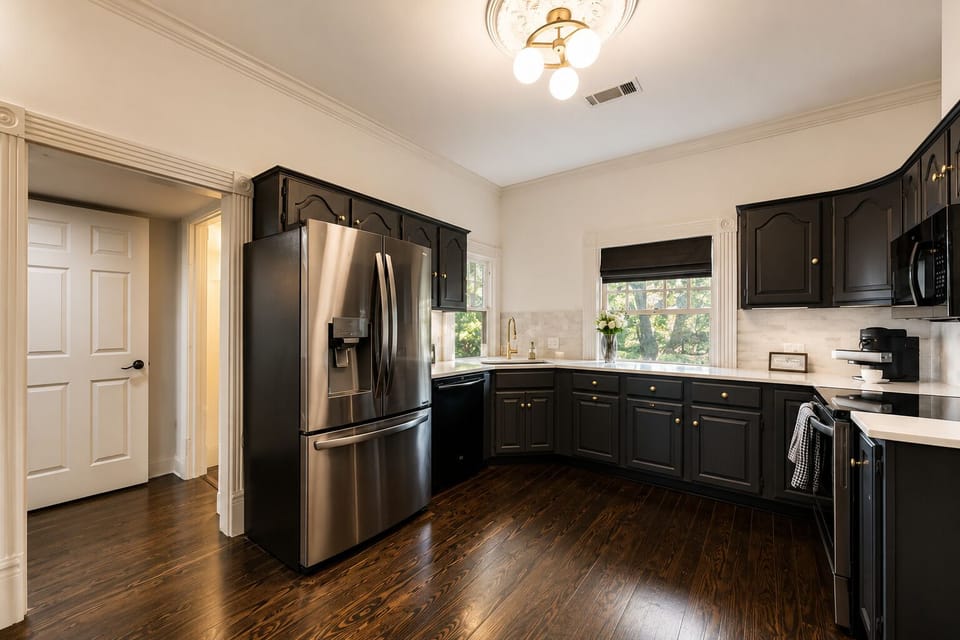 A spacious kitchen featuring top-of-the-line, full-size modern appliances, thoughtfully selected to make meal preparation both seamless and effortless.