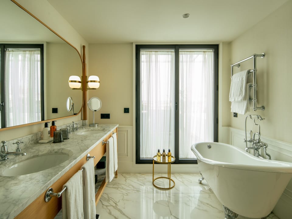Eco-friendly toiletries, hair dryer, bathrobes, slippers