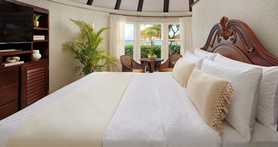 Premium Suite, 1 Bedroom, Ocean View (Caribbean Beachfront Butler Rondoval) | Premium bedding, minibar, in-room safe, blackout drapes