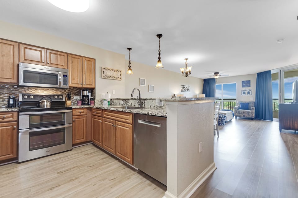 Your spacious kitchen opens to a bright living area with stunning views, perfect for cooking and relaxing together.