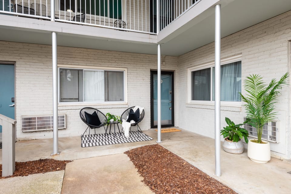 1st floor corner unit with storm door. 