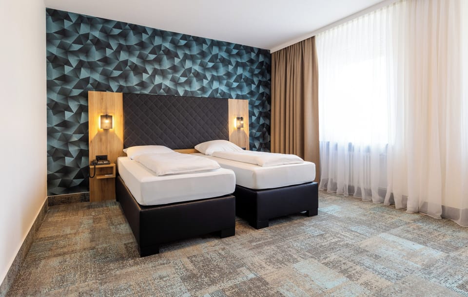 Superior Double Room, Courtyard View | In-room safe, desk, iron/ironing board, rollaway beds
