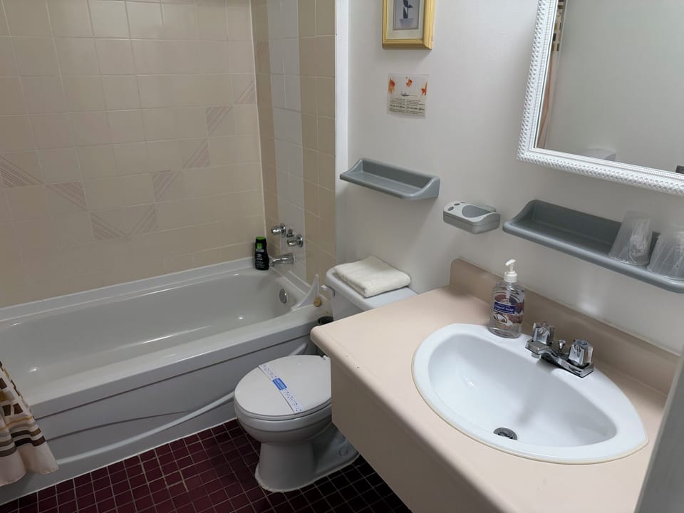Studio, 1 Queen Bed with Sofa bed | Bathroom | Combined shower/tub, hair dryer, towels