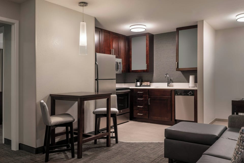 Studio, 1 King Bed with Sofa bed | Private kitchen | Fridge, microwave, stovetop, dishwasher