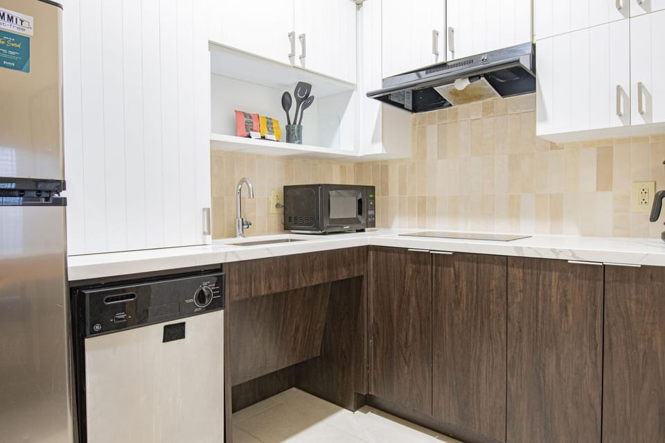 Accessible kitchen with full-size appliances and open layout.