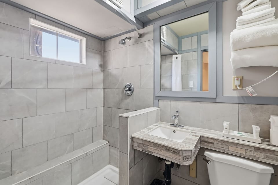Room, 2 Queen Beds, Non Smoking, Kitchenette | Bathroom | Combined shower/tub, free toiletries, towels