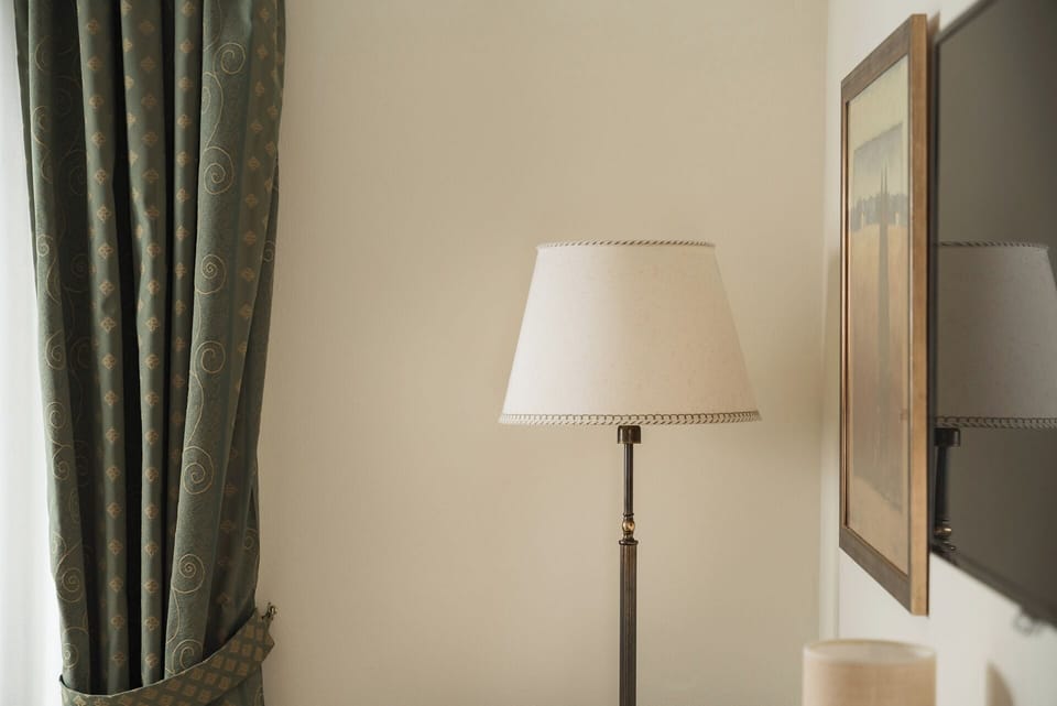 Executive Double or Twin Room | Living area | 24-inch LCD TV with digital channels, TV