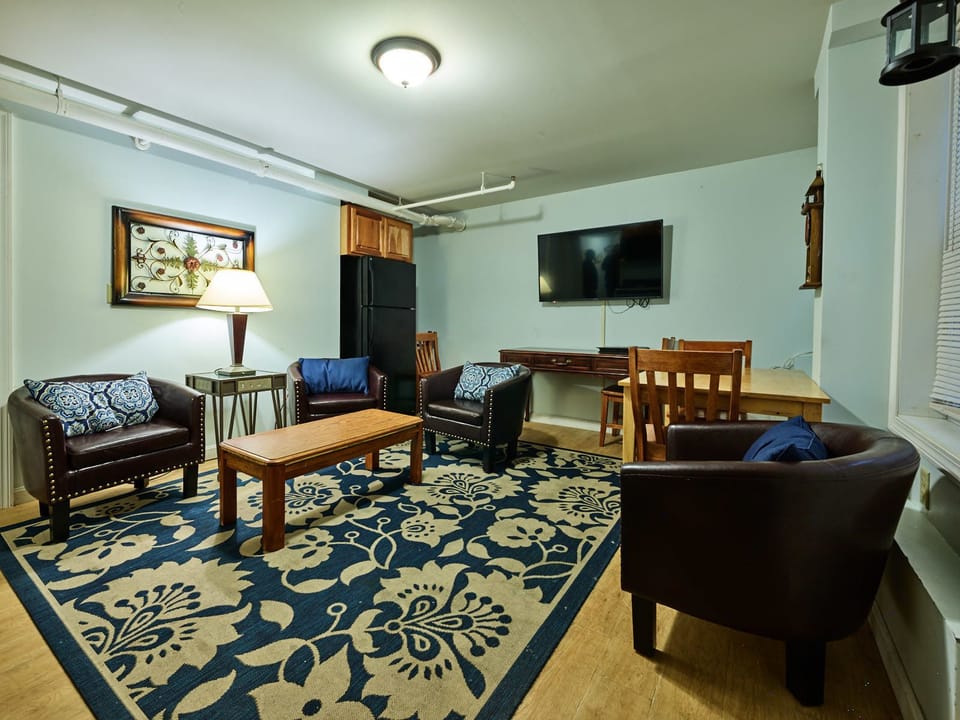 Family Apartment (no balcony, no view) | Living area | Flat-screen TV