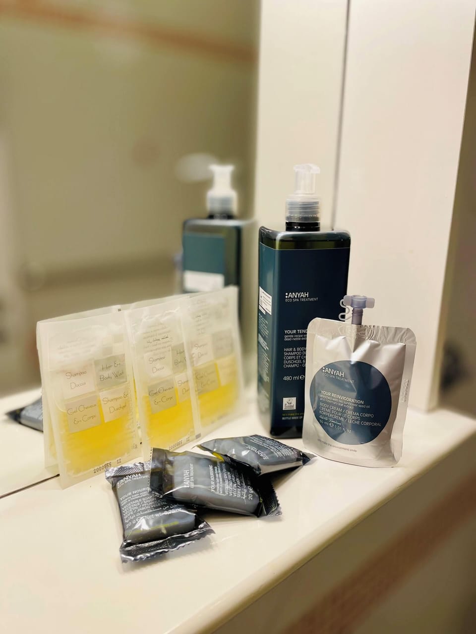 Shower, rainfall showerhead, designer toiletries, hair dryer