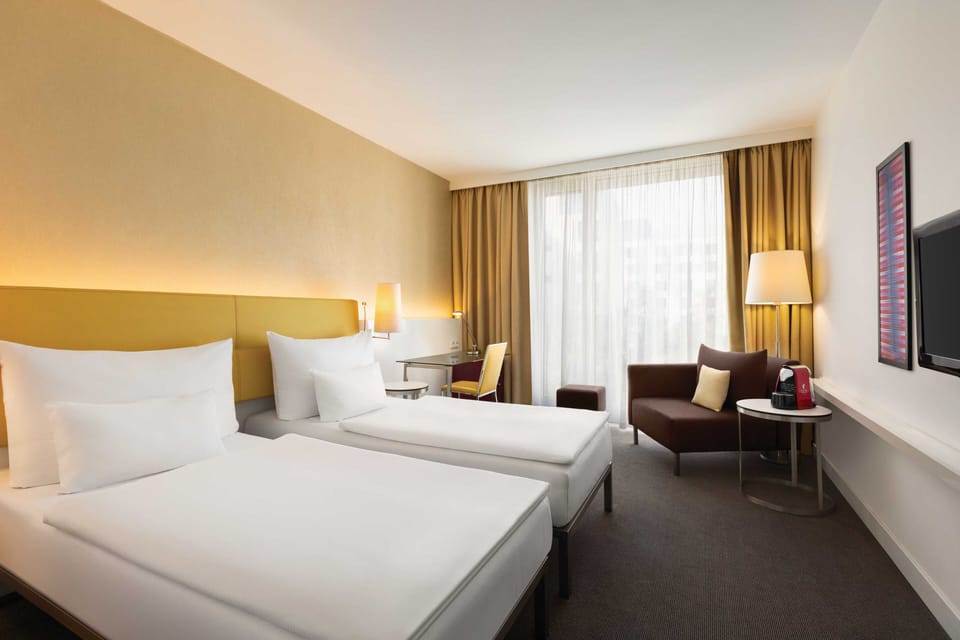 Hypo-allergenic bedding, in-room safe, desk, laptop workspace