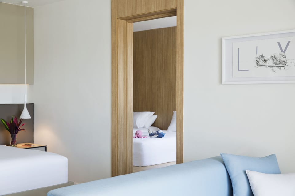Premium bedding, pillowtop beds, free minibar items, in-room safe
