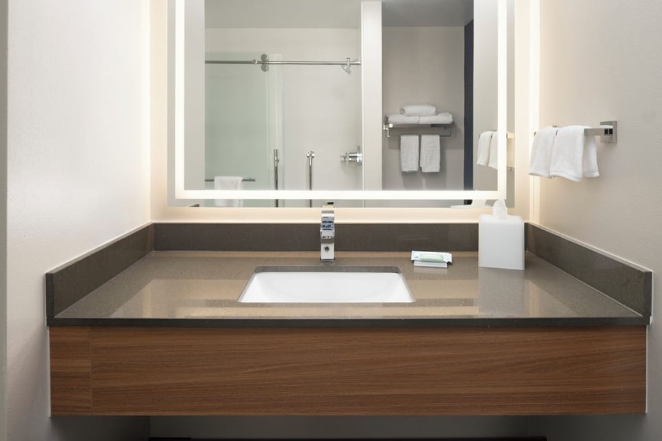 Room, 2 Double Beds | Bathroom | Combined shower/tub, free toiletries, hair dryer, towels