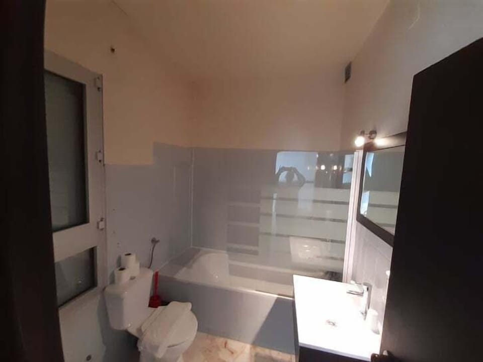 Rainfall showerhead, towels, soap, shampoo