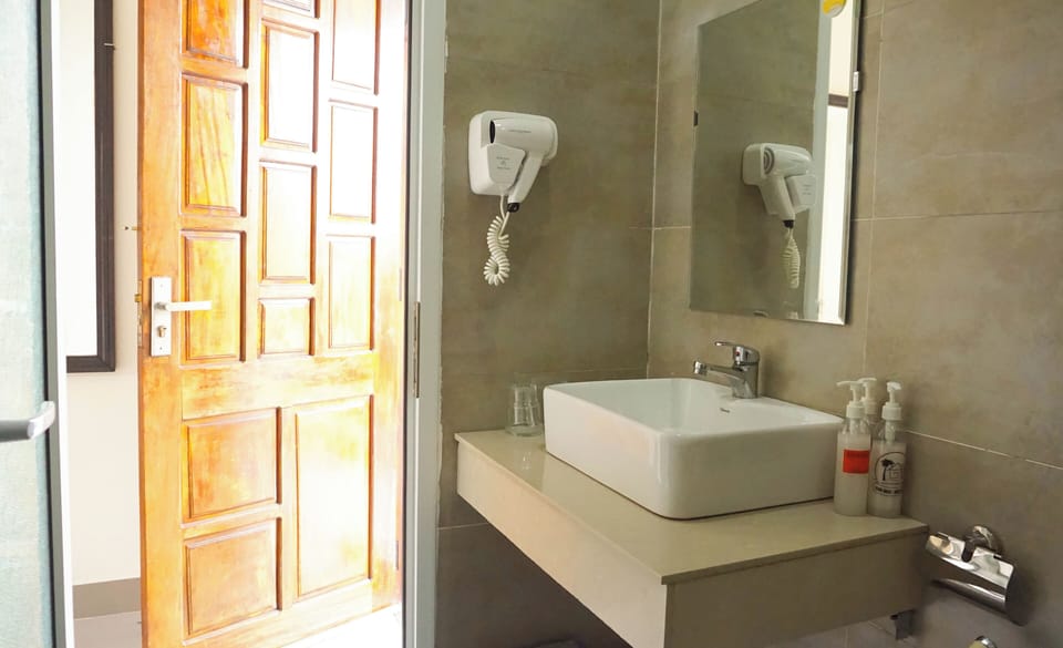 Shower, rainfall showerhead, designer toiletries, hair dryer