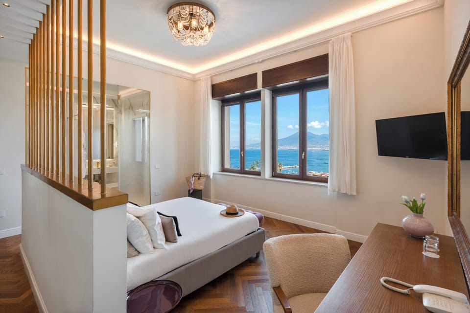 Junior Double Room, Sea View | Hypo-allergenic bedding, down comforters, minibar, in-room safe