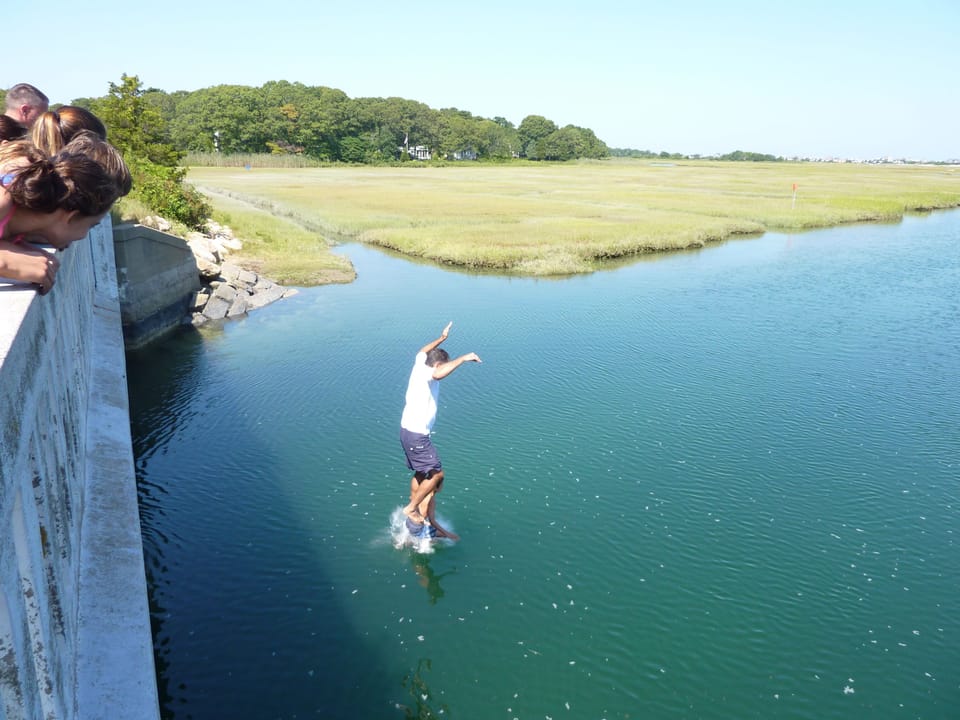 Jumping off from a local bridge -just down the street