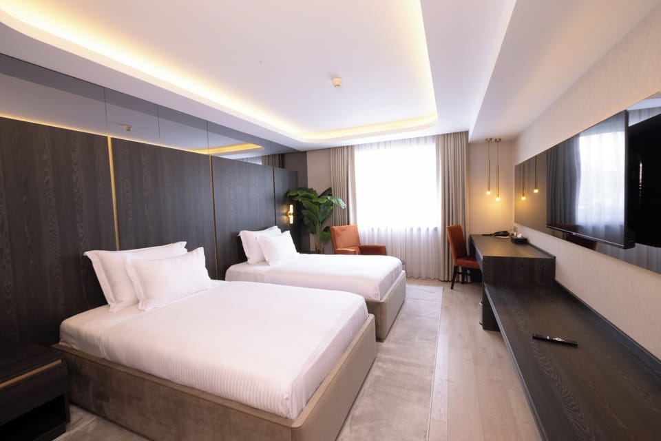 Down comforters, minibar, in-room safe, desk
