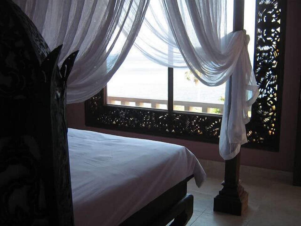 Villa, 1 Bedroom, Ocean View | Minibar, in-room safe, desk, free cribs/infant beds