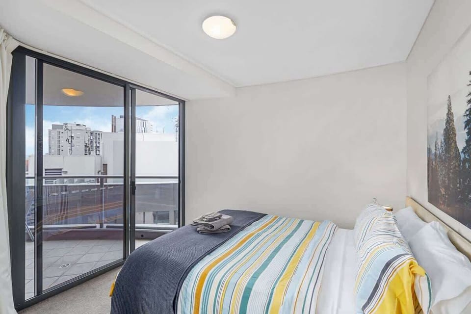 Queen Bedroom, opening to Balcony