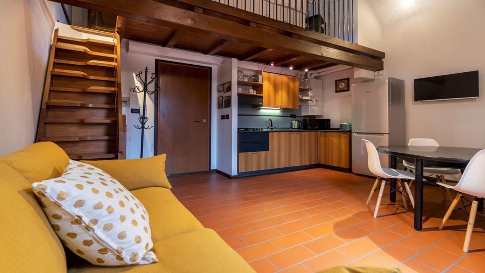 Apartment (1 Bedroom) | Living area | 55-inch TV with cable channels