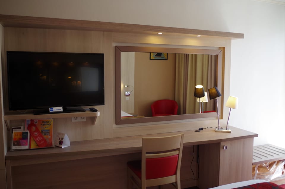 Exclusive Quadruple Room, 1 Bedroom | Minibar, in-room safe, desk, soundproofing