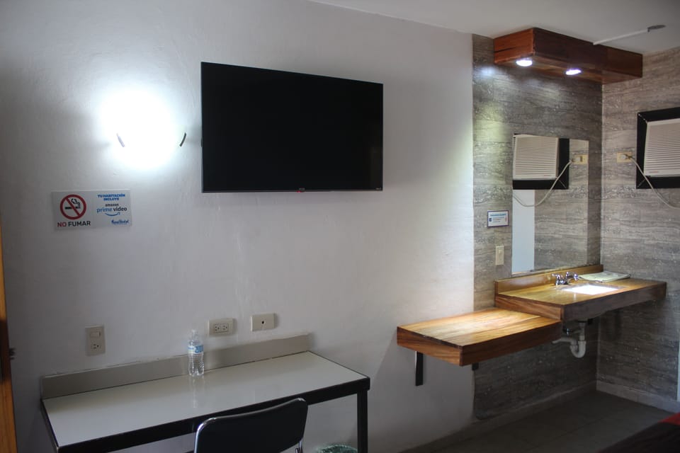 Premium bedding, memory foam beds, desk, laptop workspace