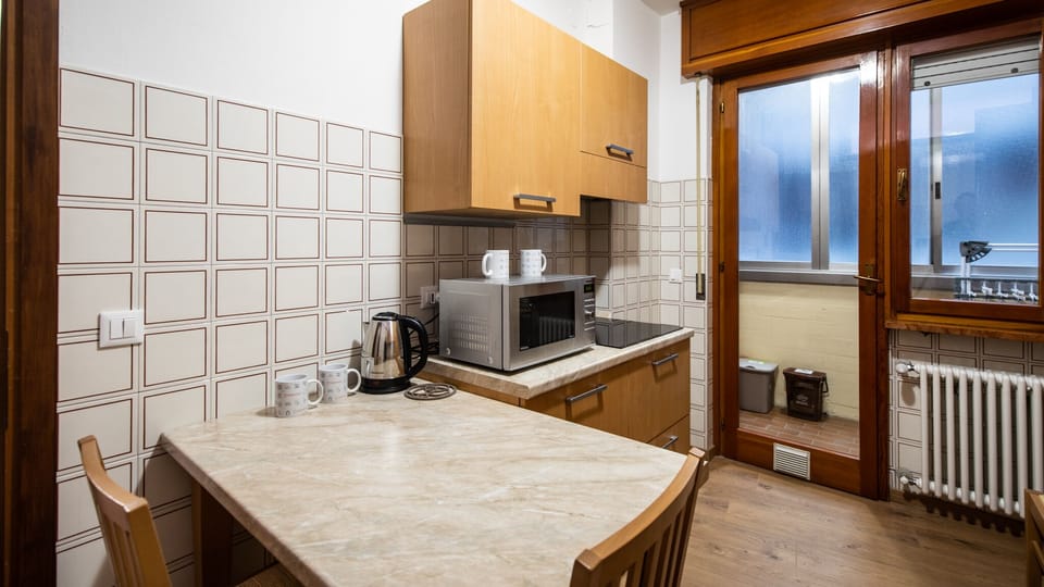 Apartment (1 Bedroom) | Private kitchen | Microwave, electric kettle, toaster, dining tables