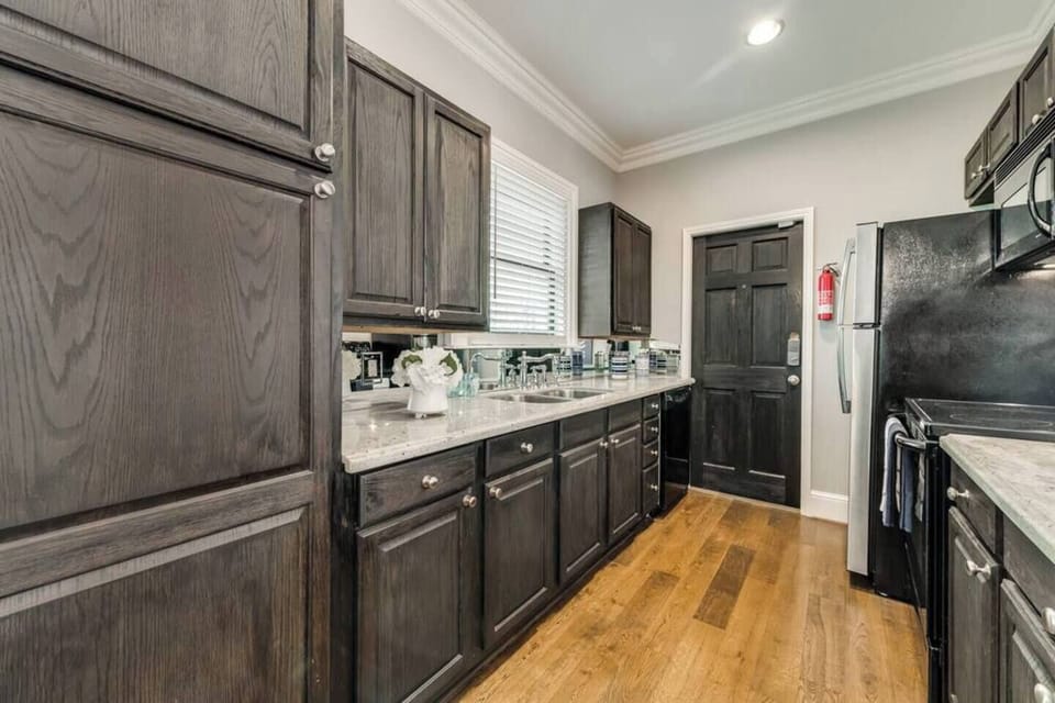 The kitchen is well-appointed with modern appliances, and all the essentials for preparing a great meal.