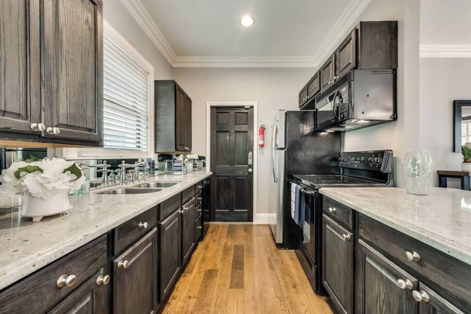 The kitchen is fully equipped with modern appliances, plenty of counter space, and all the essentials you’ll need for cooking and dining.