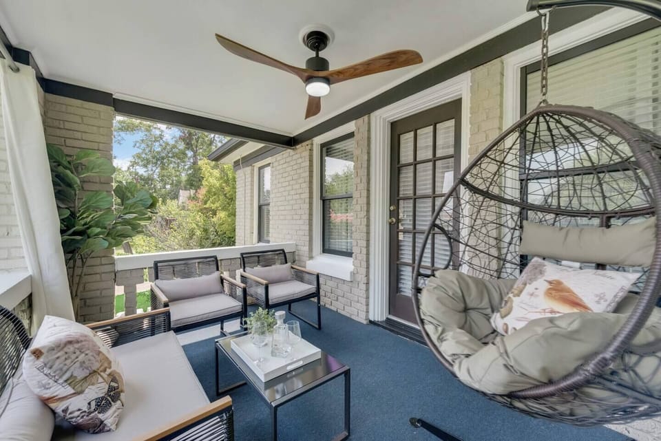 Private balcony with comfortable seating and plenty of space for both relaxing and entertaining.
