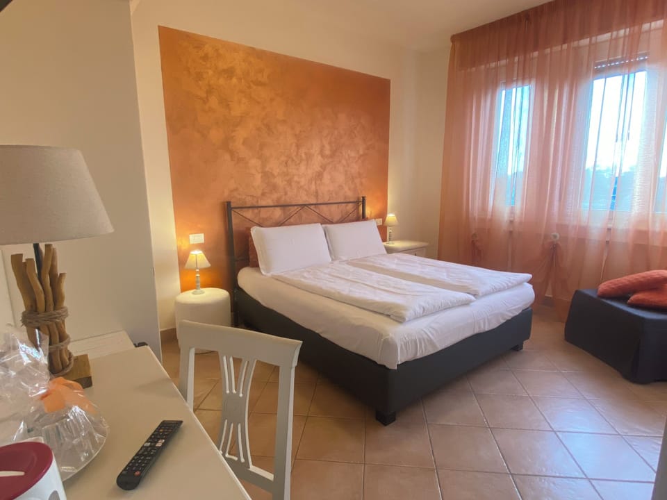 Double Room, Garden View | Desk, rollaway beds, free WiFi, bed sheets