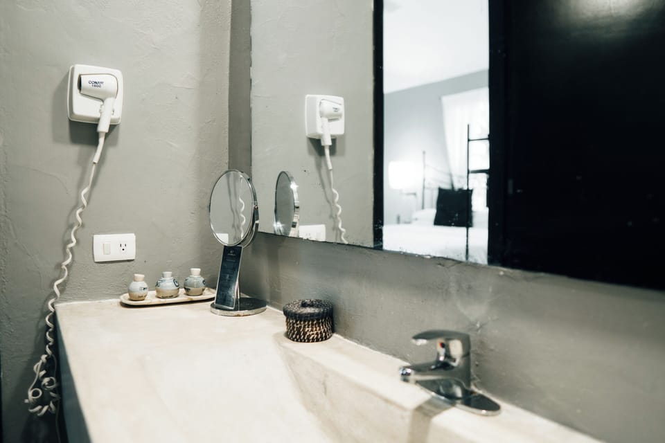 Suite, 1 King Bed, Terrace, Garden Area | Bathroom | Shower, free toiletries, hair dryer, bathrobes