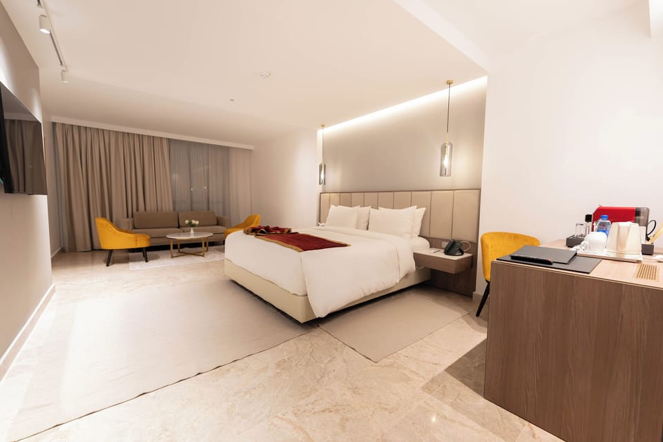 Premium bedding, memory foam beds, minibar, desk
