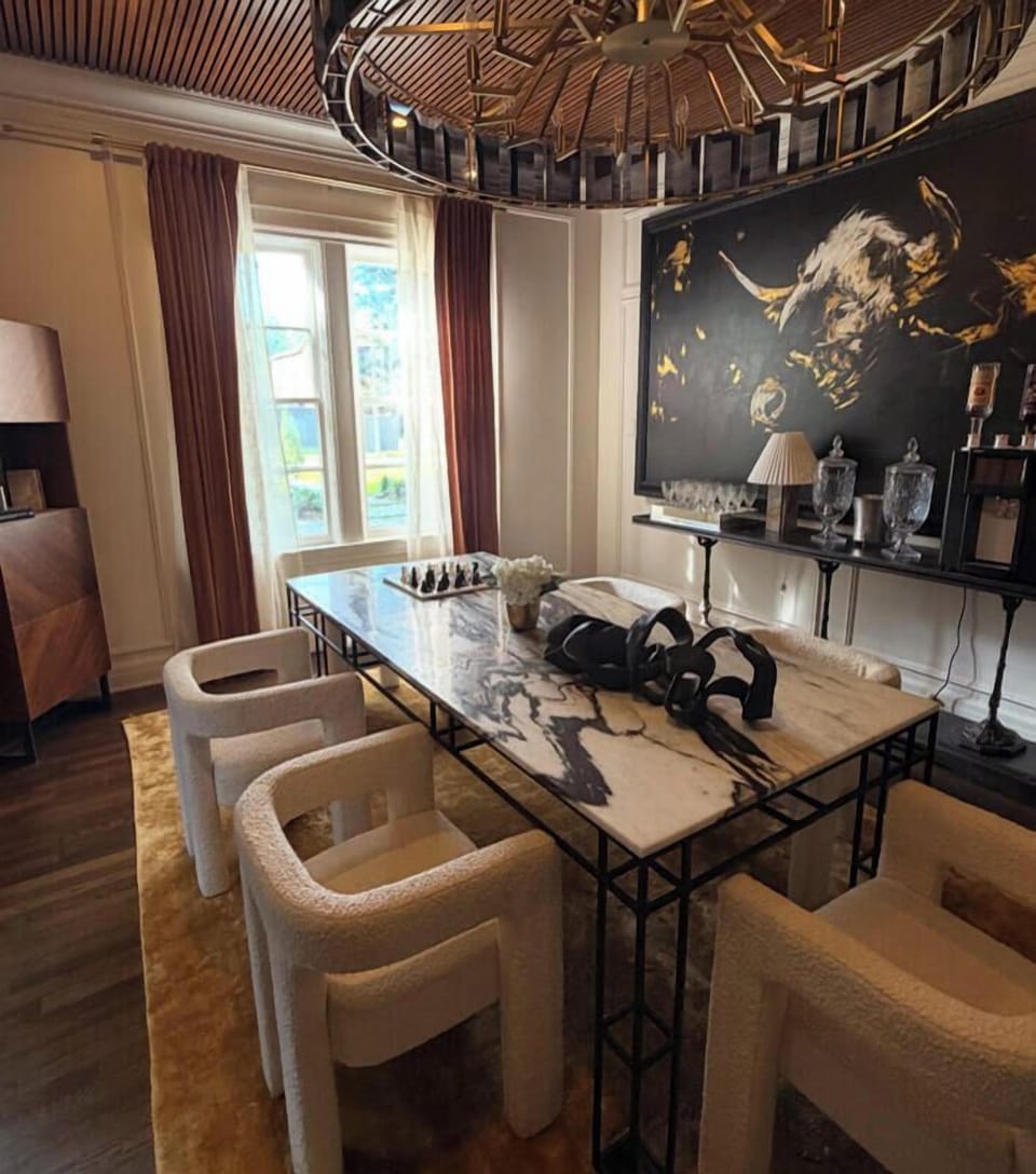 Off-site  with in 5 mins away is a  dining space with designer lighting and a striking landscape mural for memorable meals or meetings.