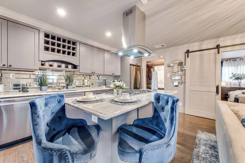 Enjoy your morning coffee with the ones you love in our designer kitchen.