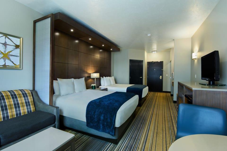 2 Queen Suite | Premium bedding, desk, laptop workspace, blackout drapes