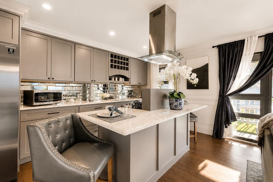 Fully equipped kitchen with gas range.