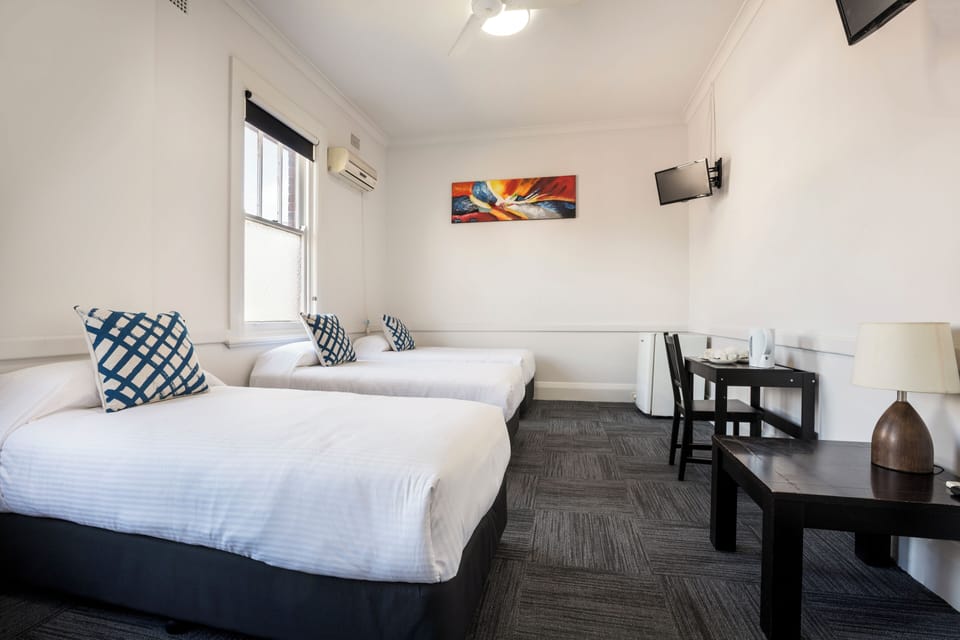 Family Room, Multiple Bedrooms, Shared Bathroom | Desk, free WiFi, bed sheets