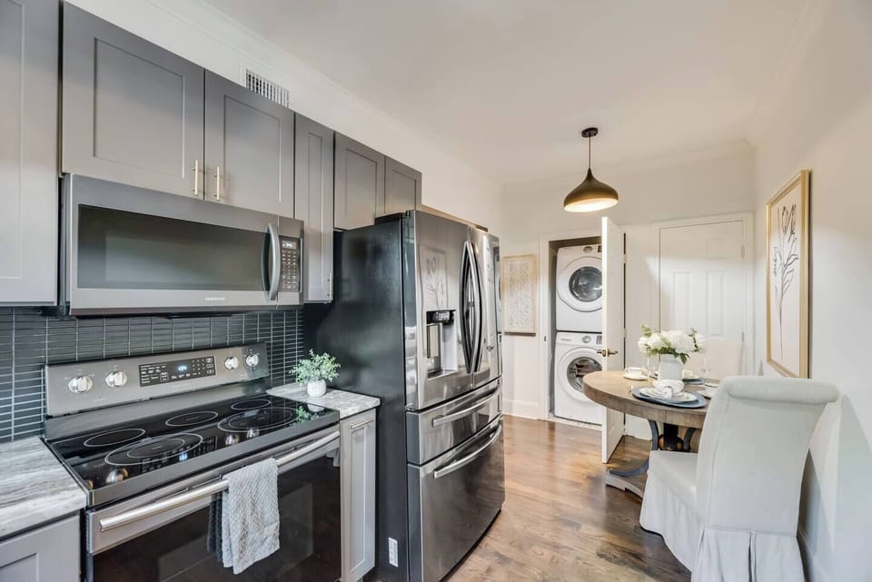 The kitchen is fully equipped with upgraded appliances, ensuring a seamless and enjoyable cooking experience during your stay.