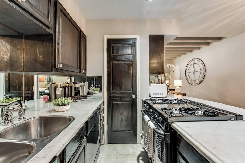 The kitchen is fully equipped with upgraded appliances, ensuring a seamless and enjoyable cooking experience during your stay.
