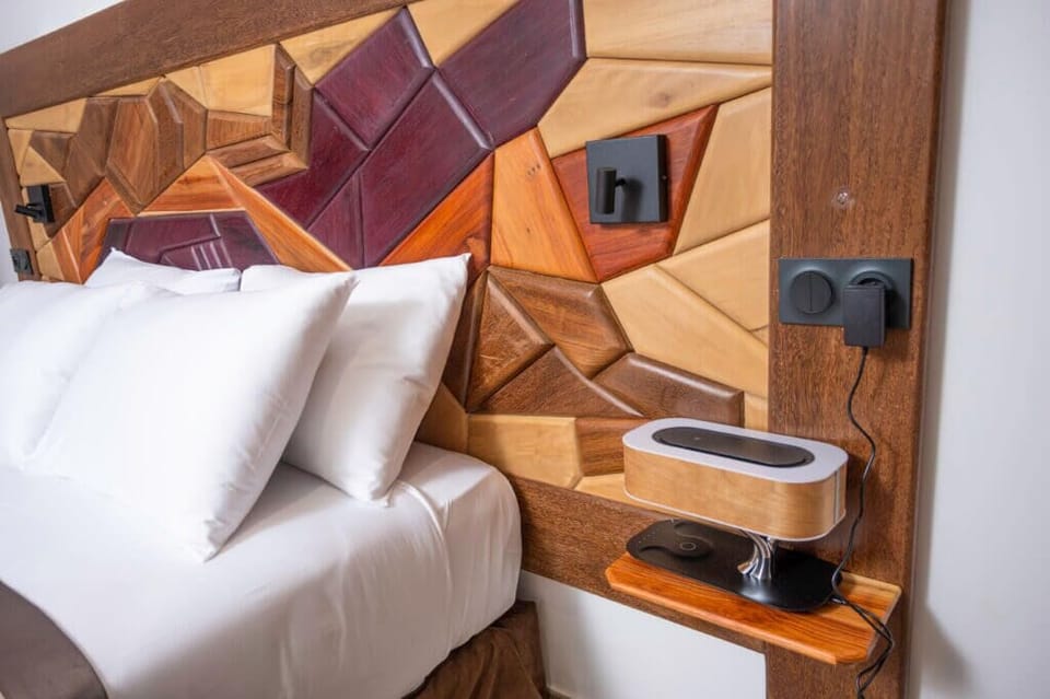 Superior Room | Minibar, in-room safe, laptop workspace, iron/ironing board