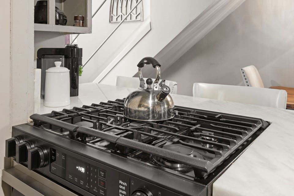 Chef’s Kitchen – Fully equipped with stainless appliances and everything you need to cook.