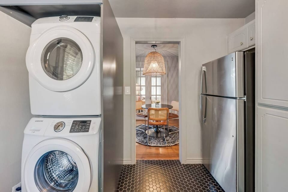 The unit comes with a convenient stackable washer and dryer, making laundry a breeze during your stay.