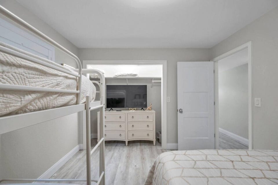 Functional bunk area w/ easy access to storage and an open, practical layout.
