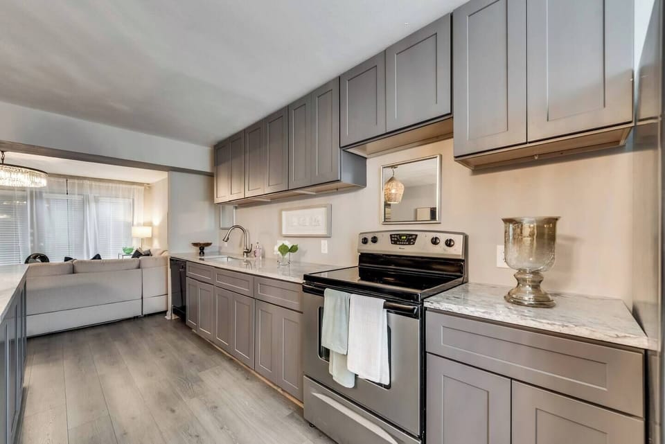 Spacious kitchen with sleek, modern appliances, fully equipped for all your cooking and dining needs.