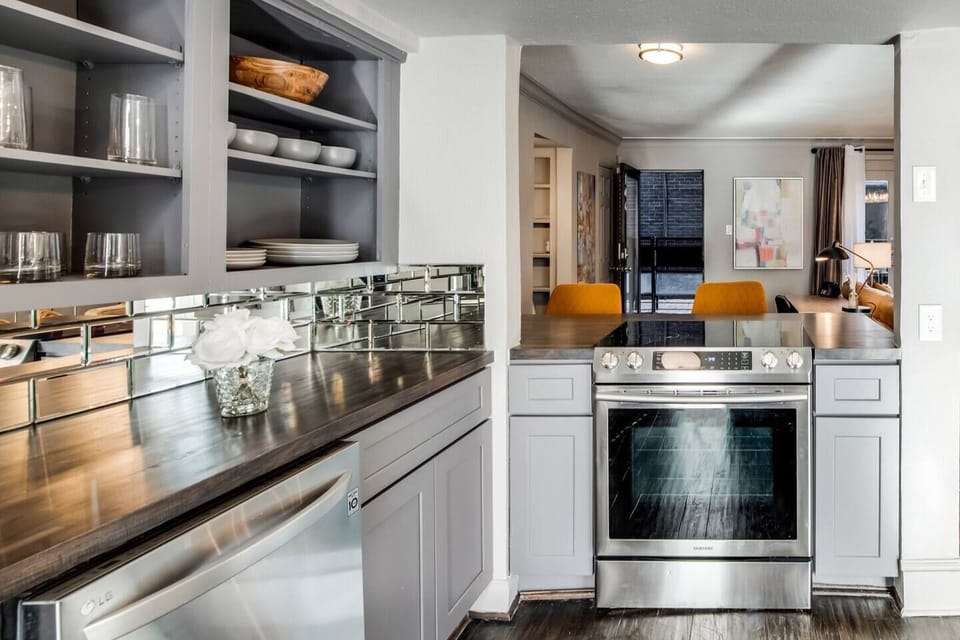 Fully equipped kitchen with sleek, modern appliances, for all your cooking and dining needs. 