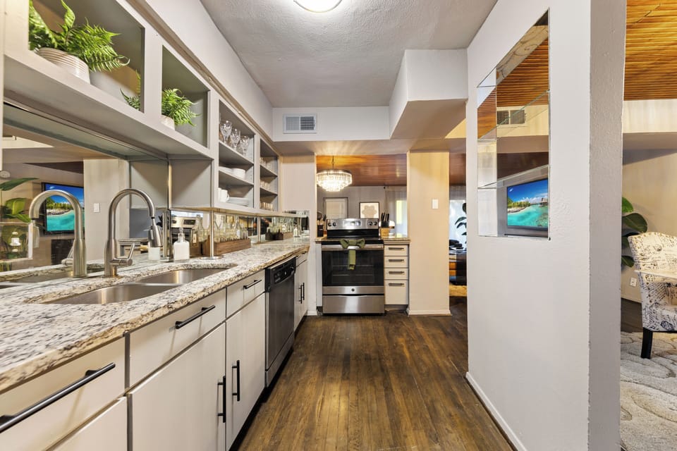 Spacious kitchen with sleek modern appliance, fully equipped for all your cooking ,  
