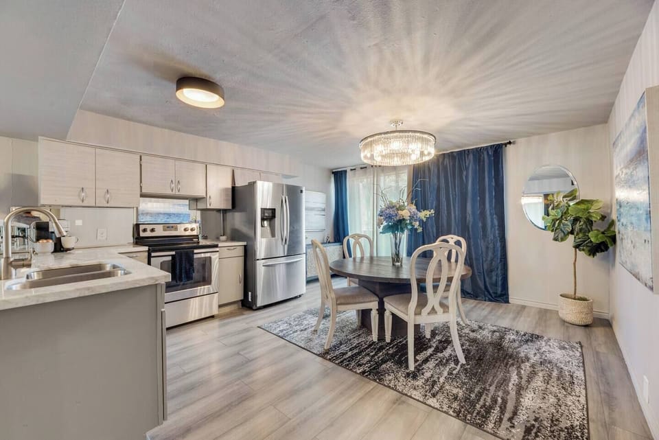 Spacious kitchen with sleek, modern appliances, fully equipped for all your cooking and dining needs.